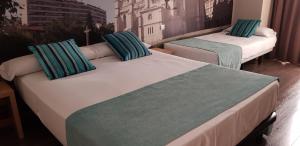 Postel nebo postele na pokoji v ubytování ELE Enara Boutique Hotel