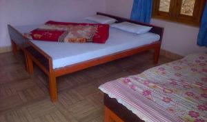 Tempat tidur dalam kamar di Hotel Everest