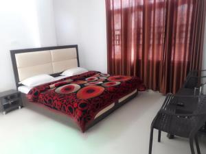 מיטה או מיטות בחדר ב-Hotel Heartbeat