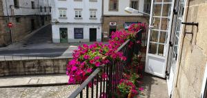 A balcony or terrace at Hostal Giadás