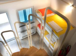 Postel nebo postele na pokoji v ubytování Apartmani Vila Caska