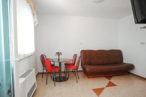 Posezení v ubytování Apartmani Vila Caska