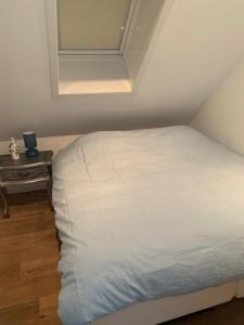 Postel nebo postele na pokoji v ubytování Beach House Callantsoog