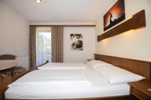 Postel nebo postele na pokoji v ubytování Haus Elisabeth
