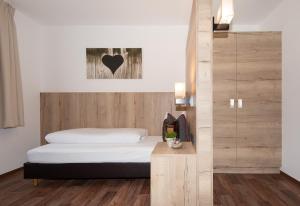 Postel nebo postele na pokoji v ubytování Haus Elisabeth