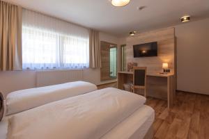 Postel nebo postele na pokoji v ubytování Haus Elisabeth