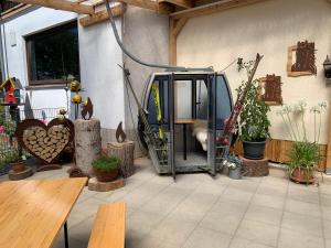 a patio with a door open in a building at Kubacher Hof in Kubach