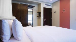 
Кровать или кровати в номере Dara Hamra
