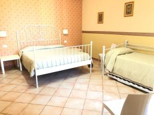 B&B Dimora Annulina客房内的一张或多张床位