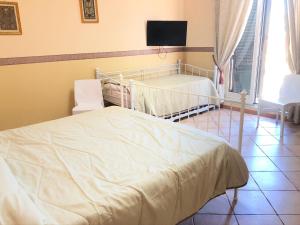 B&B Dimora Annulina客房内的一张或多张床位