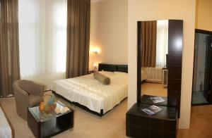 Voodi või voodid majutusasutuse Depandans Jezero toas