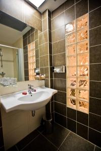 Vannituba majutusasutuses Depandans Jezero