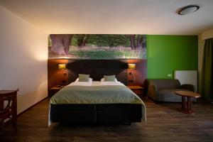 Postel nebo postele na pokoji v ubytování Boshotel - Vlodrop, Roermond