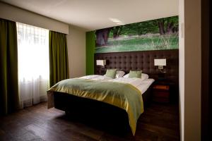 Postel nebo postele na pokoji v ubytování Boshotel - Vlodrop, Roermond