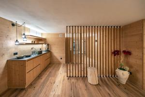 Kuchyň nebo kuchyňský kout v ubytování Hotel Torgglerhof