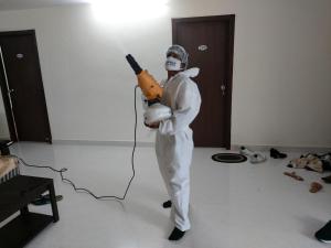 a person dressed in a gasmask holding aqualuitous at Feel like home -Guest House near Tenneti park in Visakhapatnam +6 photos
