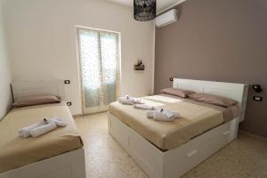 Tempat tidur dalam kamar di La Casetta sul Mare