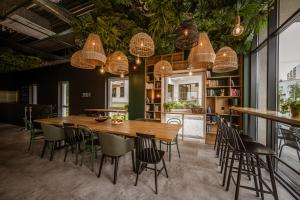 Reštaurácia alebo iné gastronomické zariadenie v ubytovaní TOP Garden Aparthotel