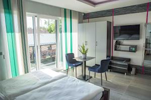 Rúm í herbergi á Hotel JURKOS +37 myndir