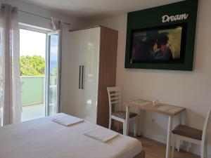 Postel nebo postele na pokoji v ubytování Guesthouse Dominović