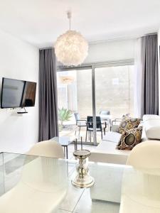 Et opholdsområde på Casa Perla - Cozy Apartment Pool Side