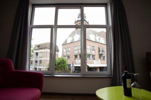 Posezení v ubytování HOLT Hotel
