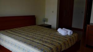 Кровать или кровати в номере Duplex Oceanos