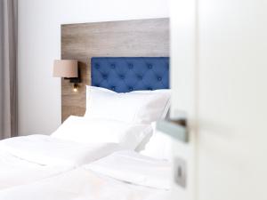 Postel nebo postele na pokoji v ubytování Premium Green Apartments Vienna