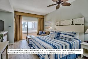 a hotel room with a bed and a window at Sandestin Resort Luau by Tufan in Destin
