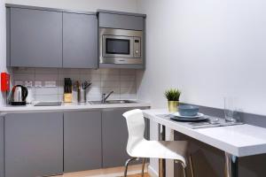 Kjøkken eller kjøkkenkrok på Swuite Dublin