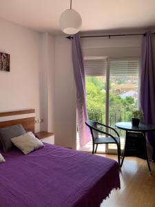 Postel nebo postele na pokoji v ubytování Apartamento en Cuevas del Becerro