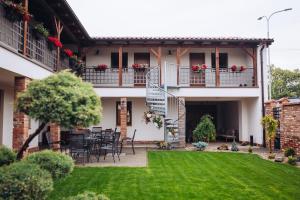 a view of a house with a yard at Penzion BLATNICE in Blatnice