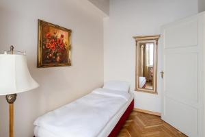 Posteľ alebo postele v izbe v ubytovaní Hotel Residence Green Lobster