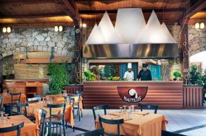 Un restaurant sau alt loc unde se poate mânca la Resort & SPA Le Dune