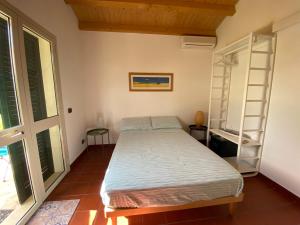 Voodi või voodid majutusasutuse Karrua House - Magnolia Room toas