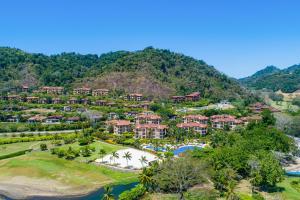 an aerial view of the resort with a mountain at Del Mar 5L in Herradura