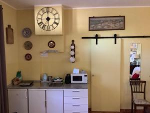 Kuchyňa alebo kuchynka v ubytovaní Mari’s House