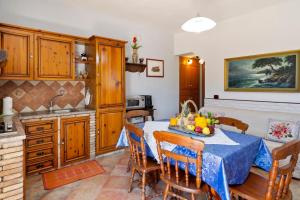 A kitchen or kitchenette at Casa Vacanze 4 Pileri