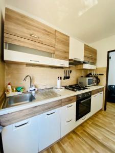 A cozinha ou cozinha compacta de Apartament Sunshine