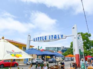a sign for a little italy on a street at International Travelers House Adventure Hostel in San Diego