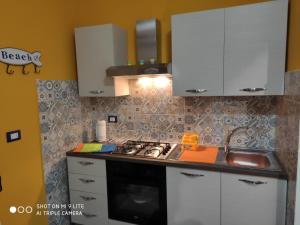 Kuchyňa alebo kuchynka v ubytovaní FILOMENA HOME