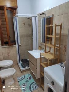 Ванная комната в FILOMENA HOME