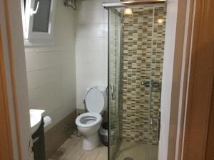 A bathroom at ASPASIA APARTMENTS