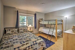 a bedroom with a bunk bed and a window at Intervale Family Retreat Mtn View and Pool Access! in Intervale