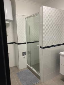 Ένα μπάνιο στο Napsugár Apartmanház