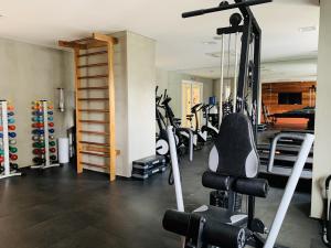 a gym with a bunch of bikes in a room at Downtown São Luis Akilê in Sao Paulo