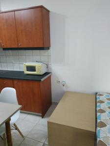 Kuchyň nebo kuchyňský kout v ubytování Urban comfortable apartment