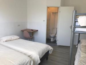 Ένα ή περισσότερα κρεβάτια σε δωμάτιο στο hotel Oosterpark