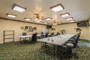 a conference room with tables and chairs in it at Apples Bed and Breakfast Inn in Big Bear Lake