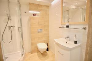 Kúpeľňa v ubytovaní Apartment BazaTatry Parkowy